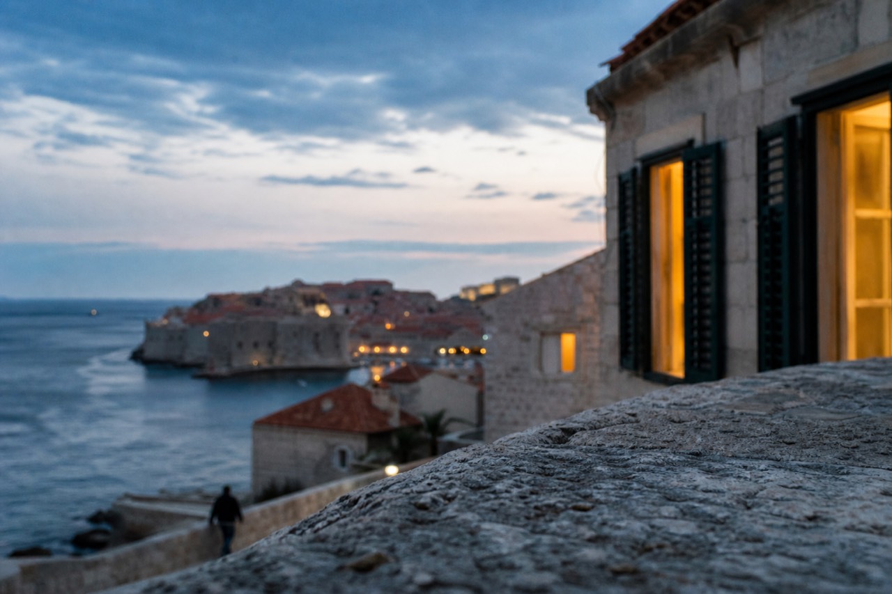 Dubrovnik Old Town rooftops and the walled city beside the blue Adriatic sea