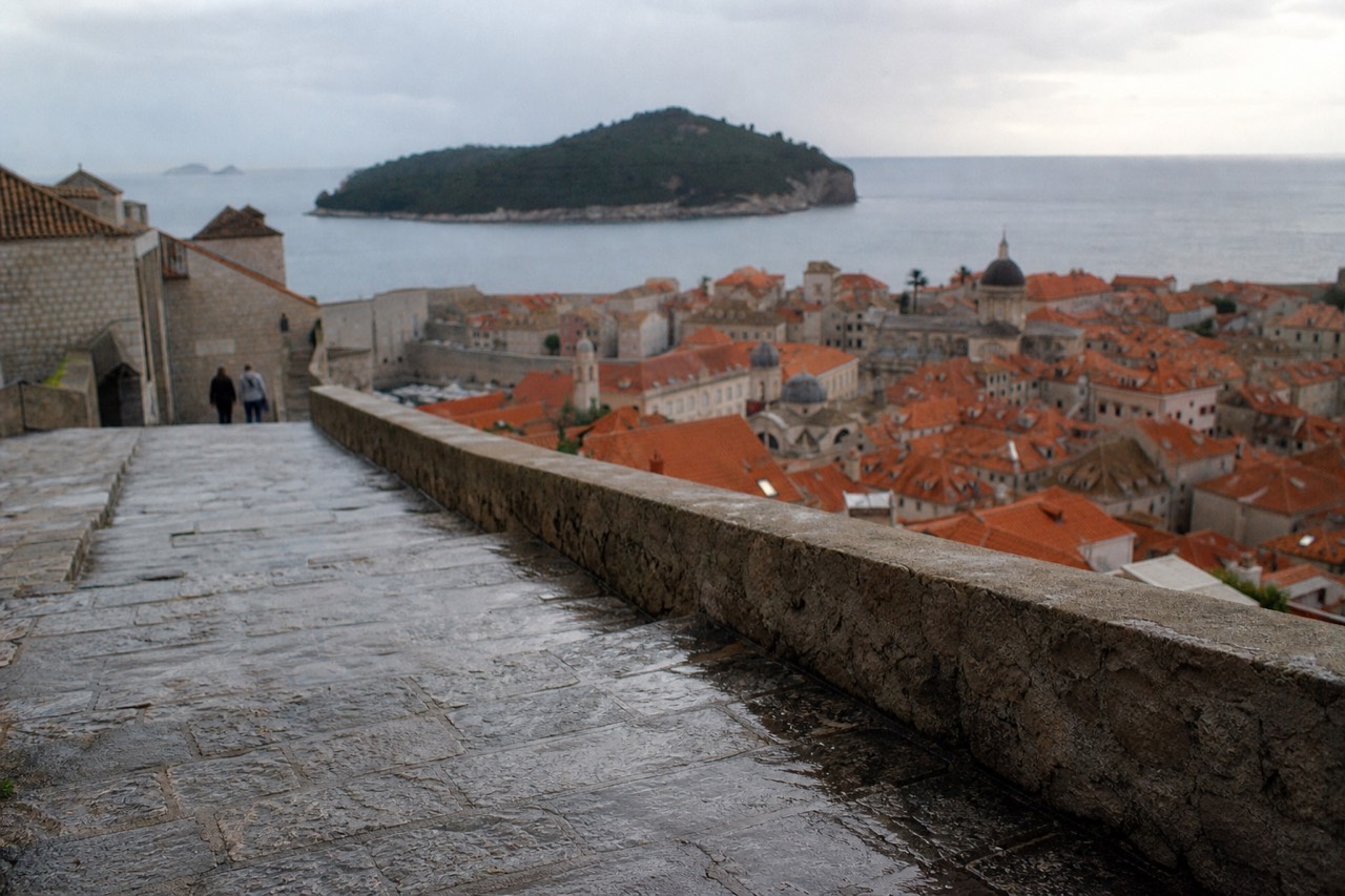 Dubrovnik Old Town rooftops seen from the city walls toward the Adriatic sea