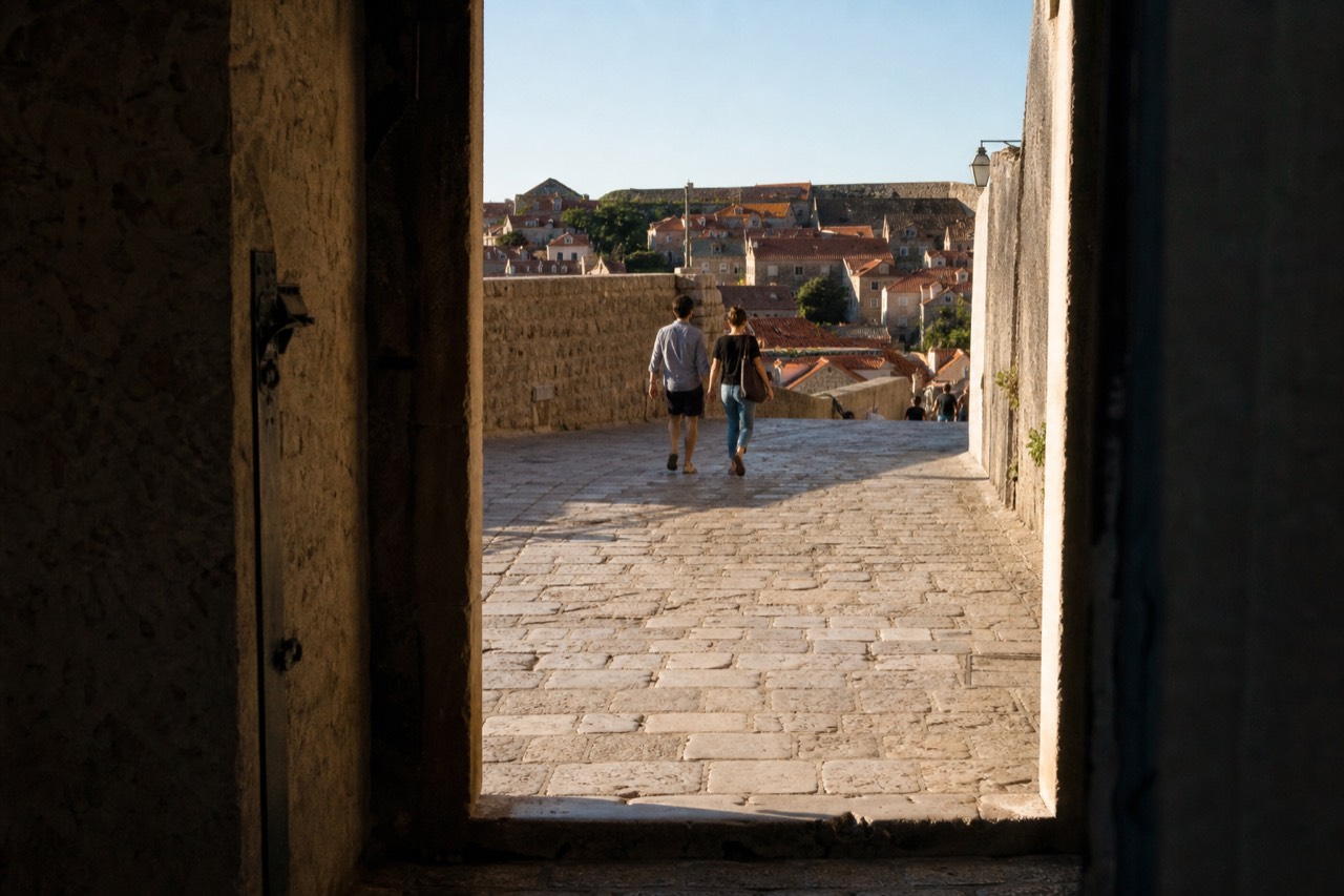 The stone streets and baroque rooftops of Dubrovnik Old Town under evening light