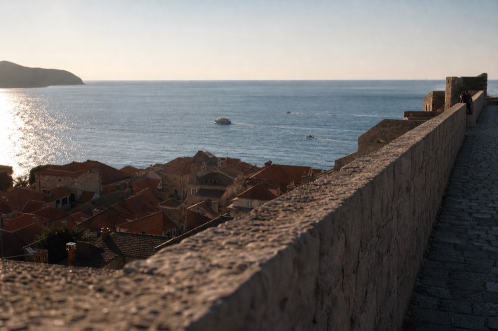 Morning light on the Dubrovnik city walls with the Old Town rooftops below