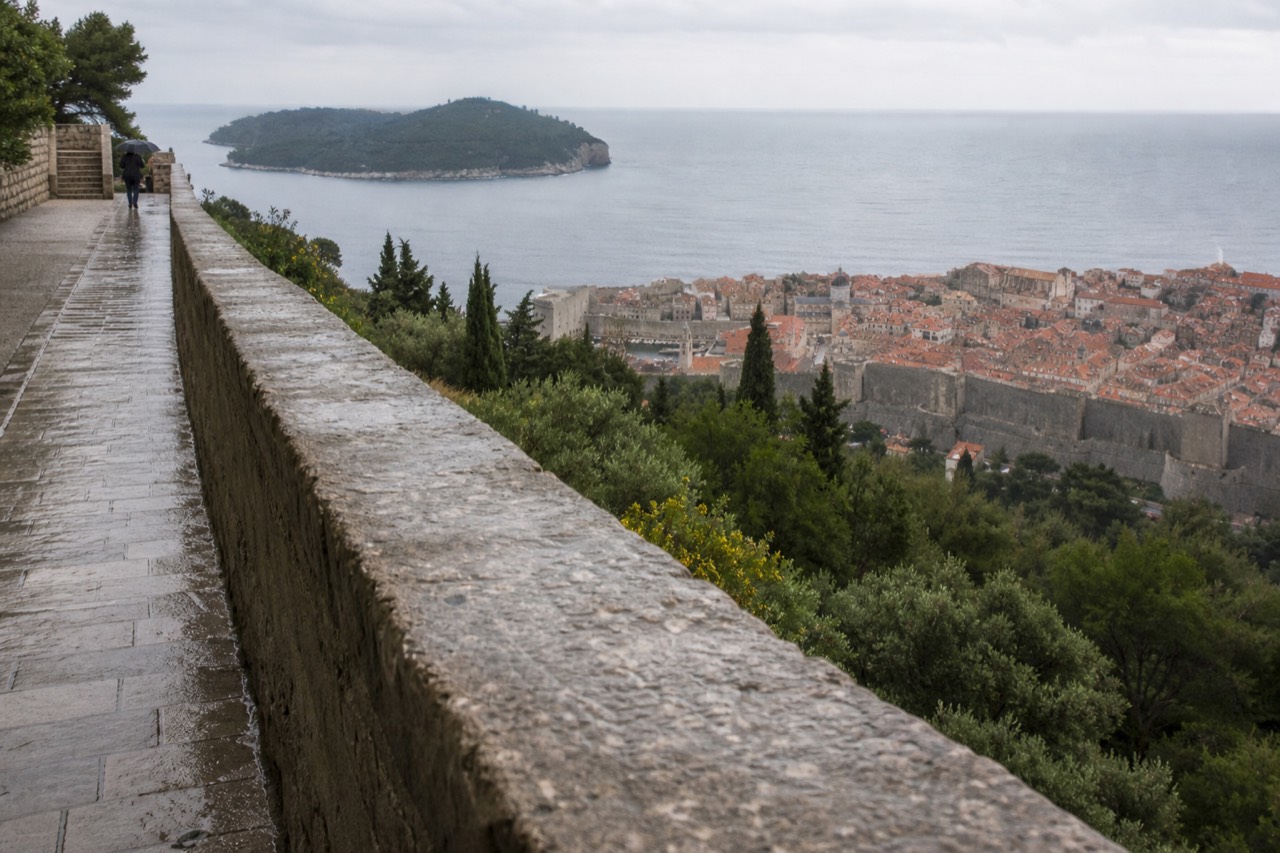 Dubrovnik rooftops and the Adriatic sea seen from a hillside above the city