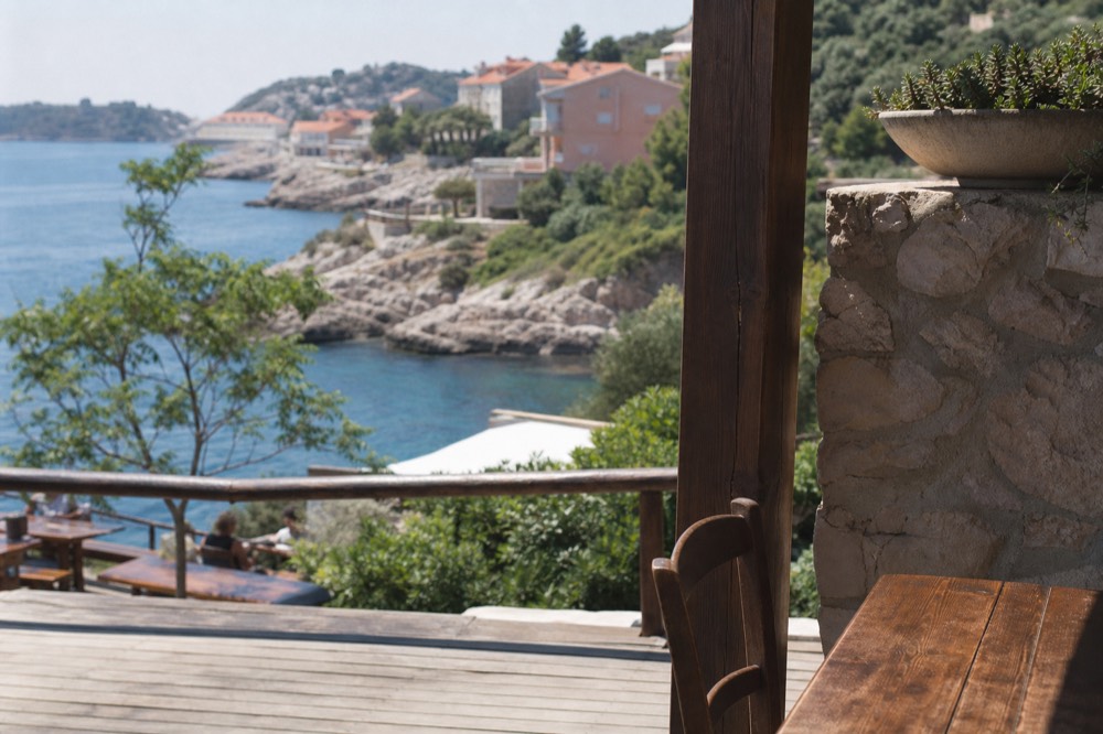 Wooden terrace of a seaside konoba restaurant near Dubrovnik