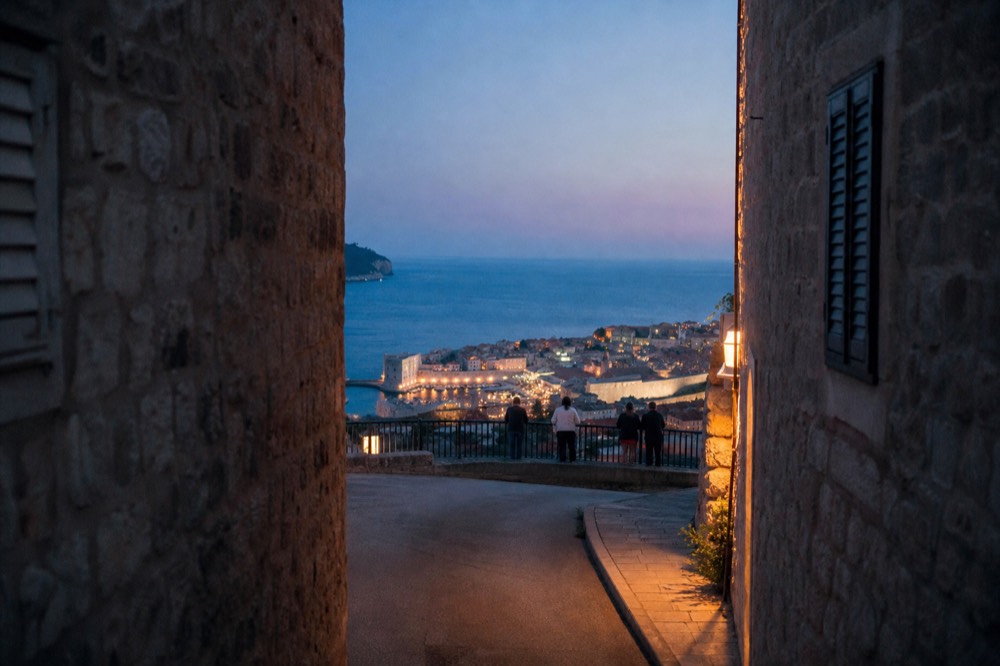 Coastal road above Dubrovnik with the walled city and Adriatic sea below