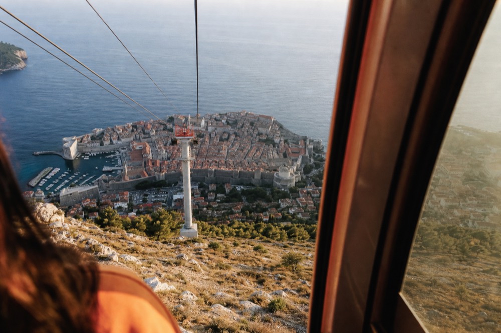 View from a cable car cabin over Dubrovnik old town and the walled city