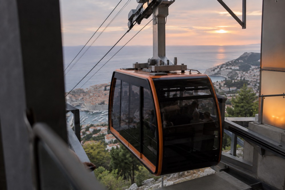 Dubrovnik cable car cabin arriving at the lower station in evening light