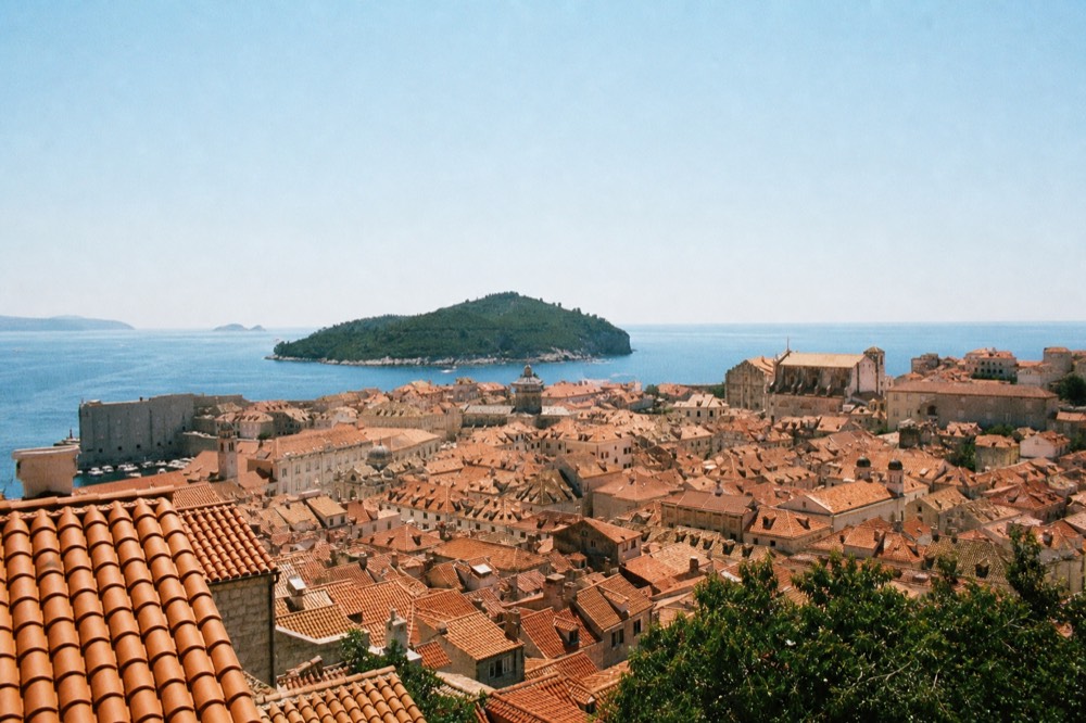 View over Dubrovnik rooftops toward the Adriatic on a calm clear day
