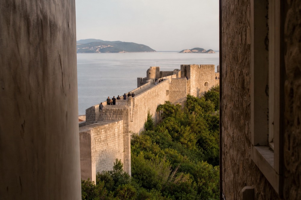 Evening light on the walls with the sea and distant islands beyond
