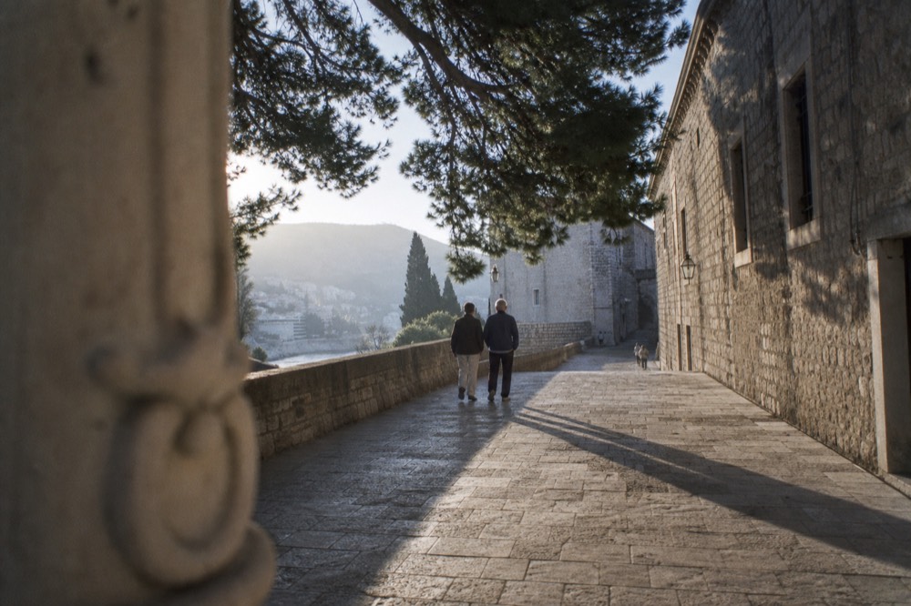 Empty Dubrovnik stone street in early morning light
