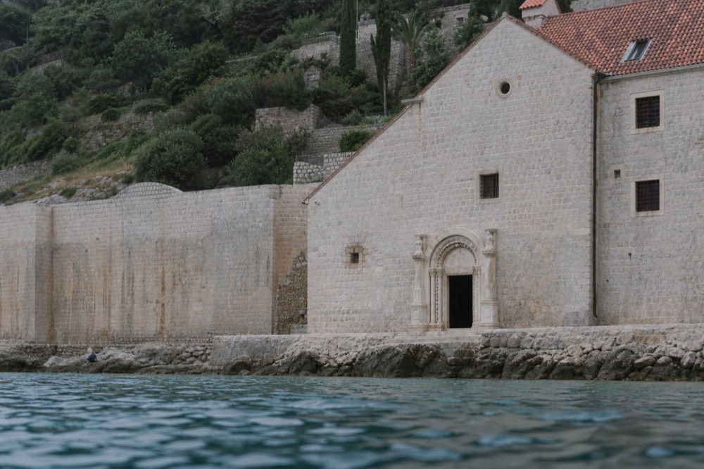 Carved stone doorway of an old Dubrovnik monastery building