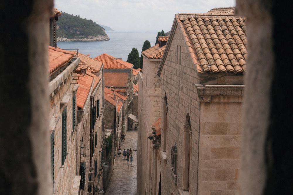 Limestone paved street lined with baroque buildings in Dubrovnik old town