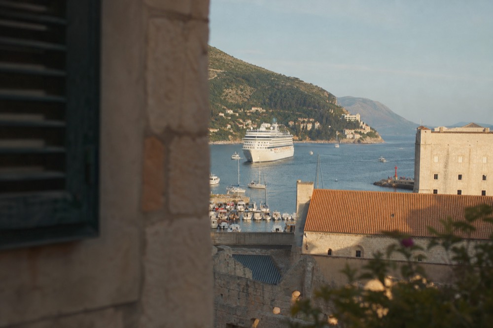 Cruise ships anchored near the old city harbour at midday